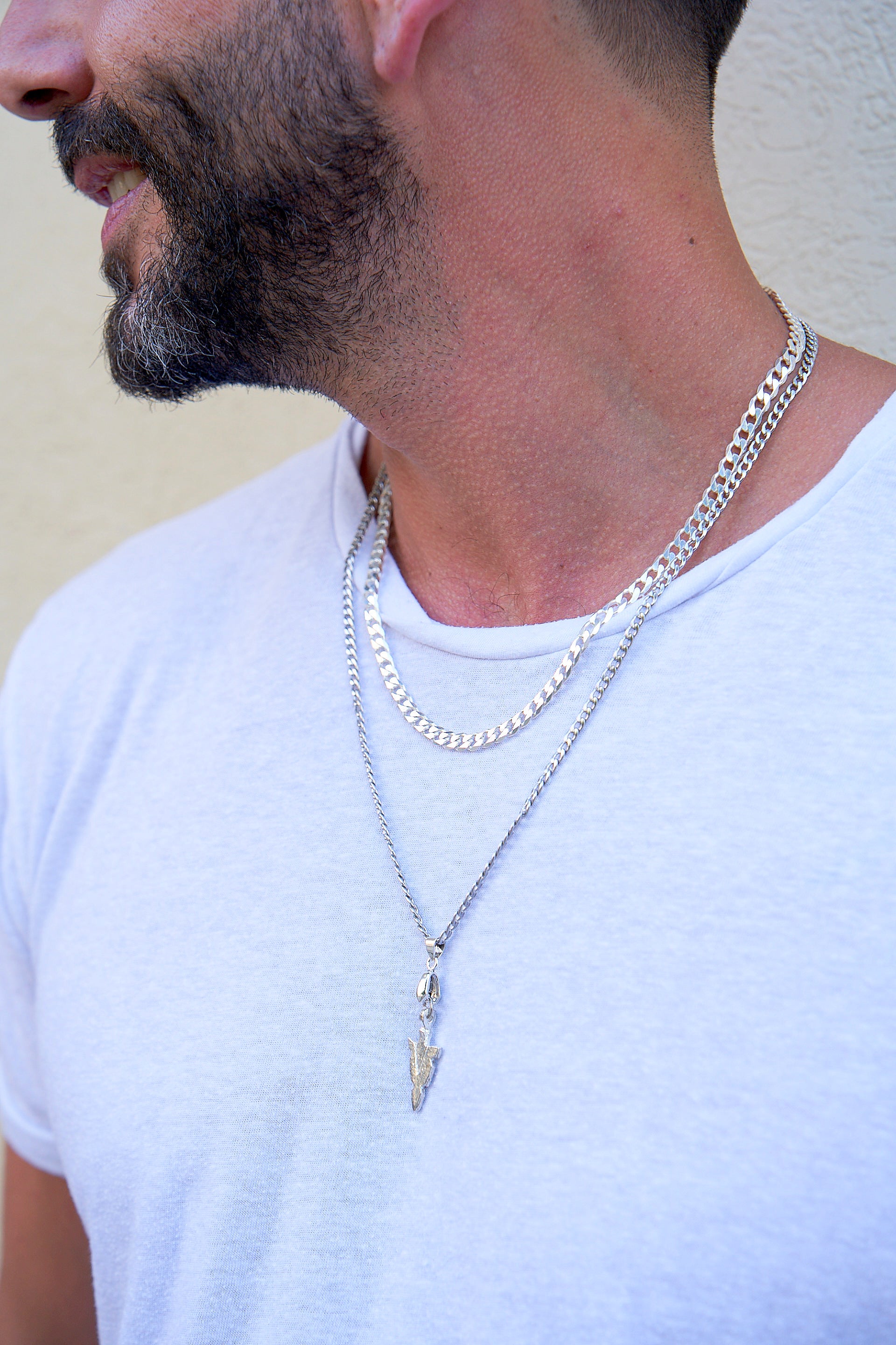 Leon | Delicate stainless steel gourmet necklace combined with a silver pendant of a dagger