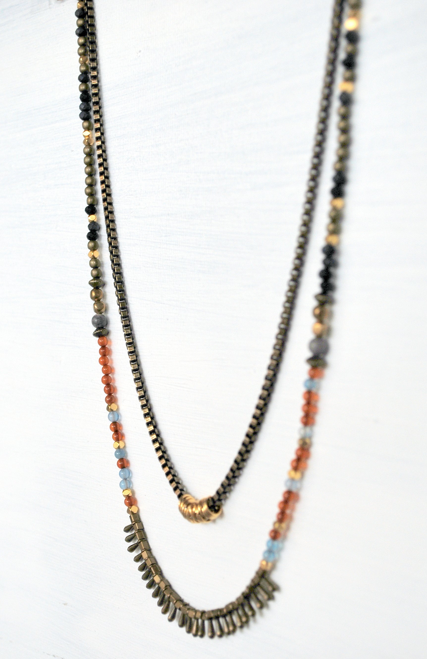 July - layered necklace in ethnic rock style