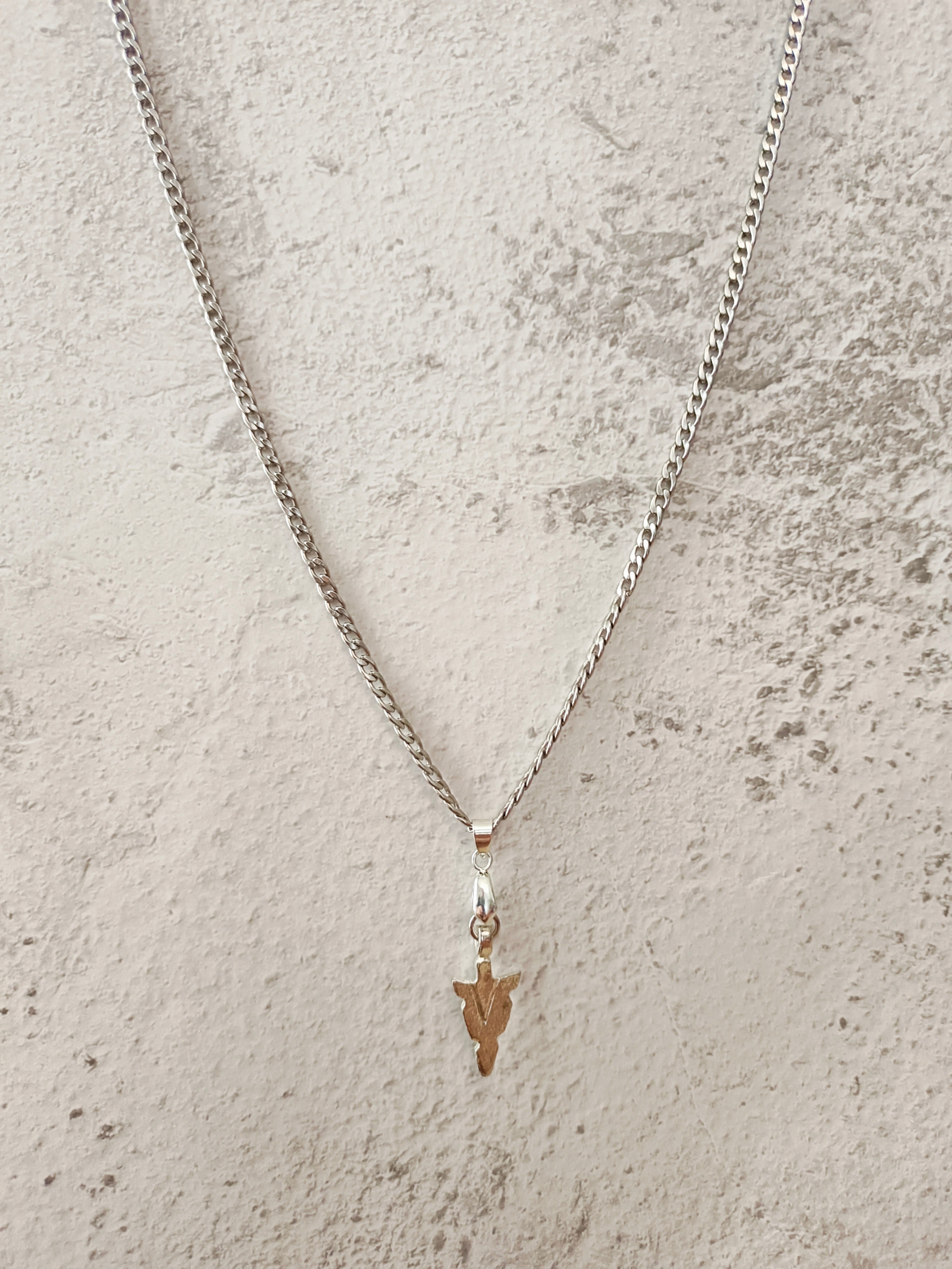 Leon | Delicate stainless steel gourmet necklace combined with a silver pendant of a dagger