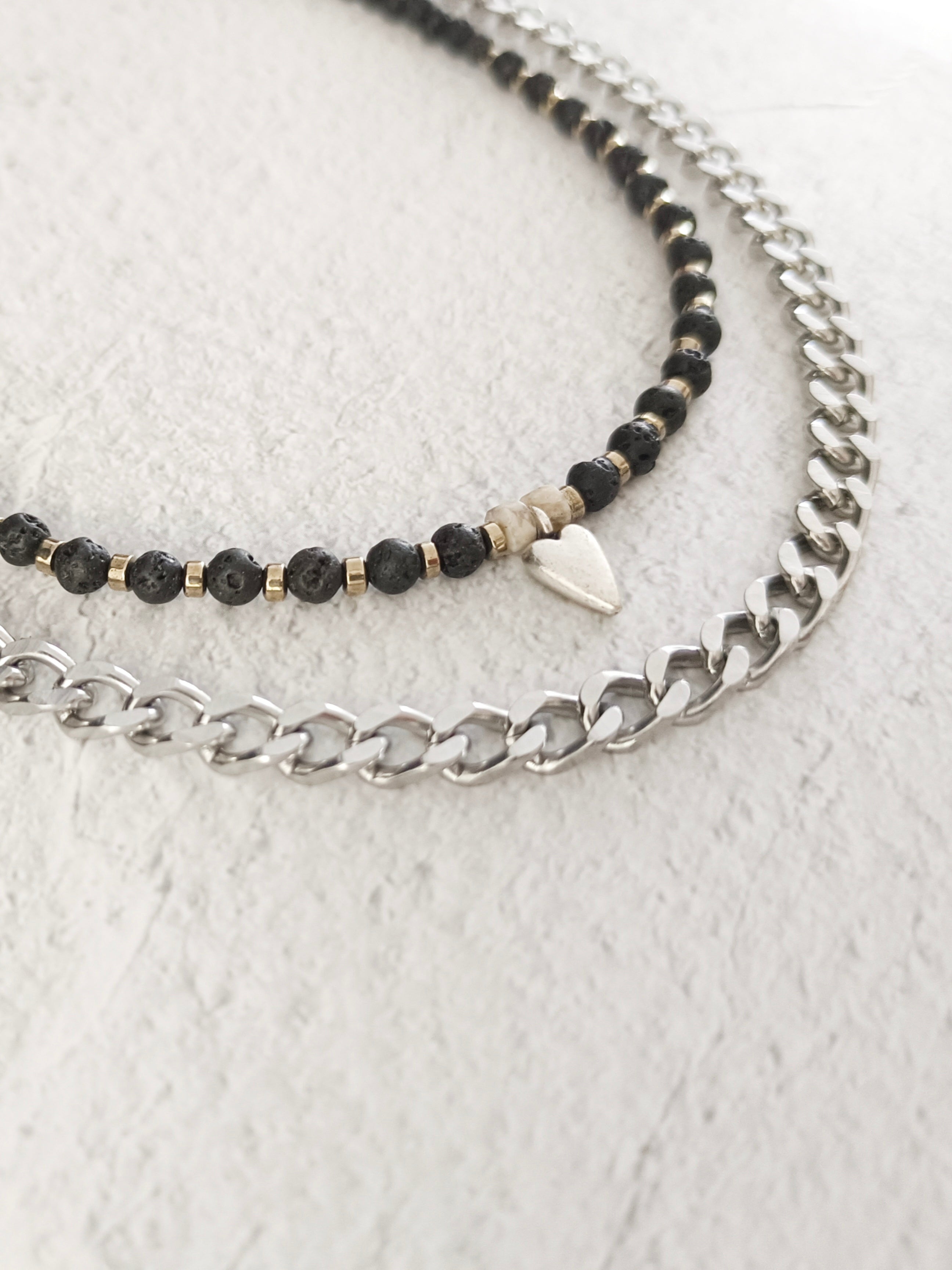 Kuchi | Silver gourmet necklace and black lava stones with heart pendant 